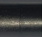 A close up of a black object
Description automatically generated